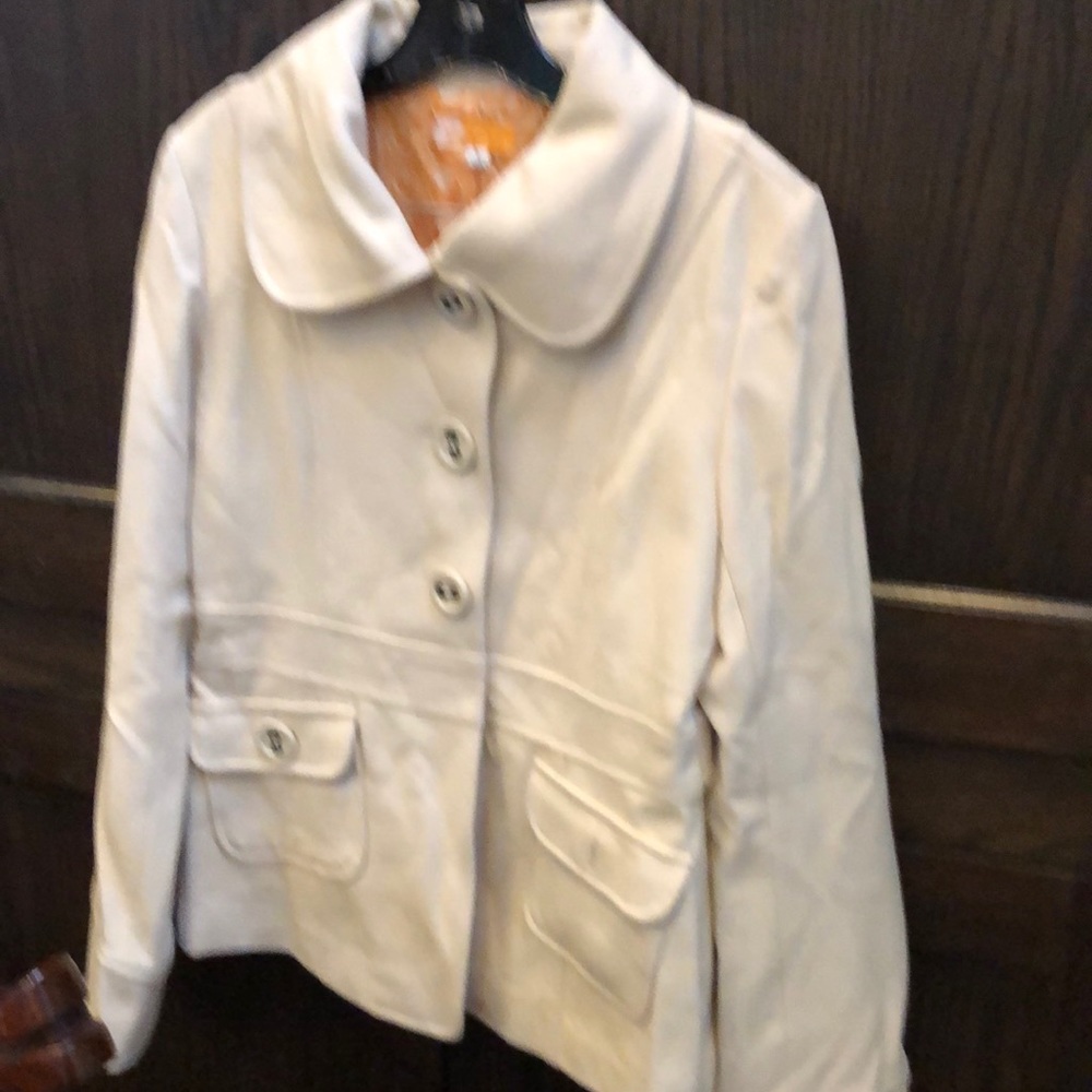 Cream wool blazer.